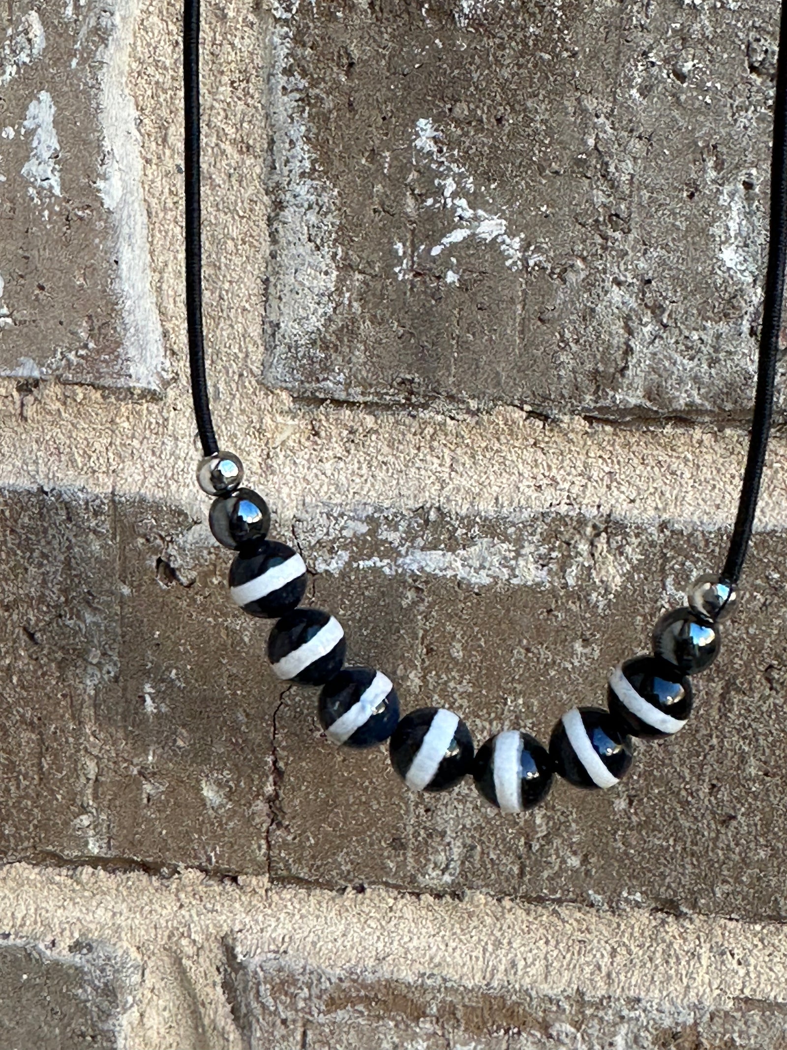 EBONY & IVORY BLACK TIBETAN AGATE SEVEN-PIECE COMP HAIRTIE